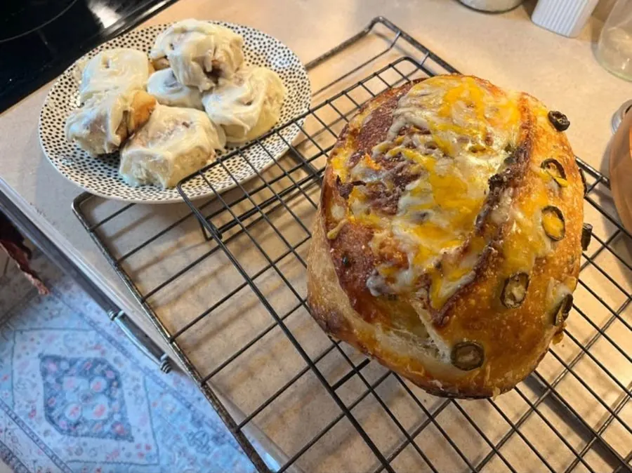 Cheddar jalapeño loaf on a cooling rack